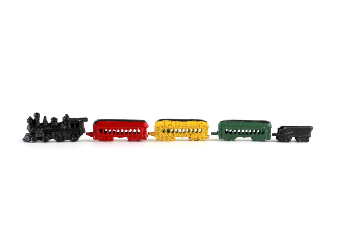 http://themustarddandelion.com/cdn/shop/products/BlackRedYellowGreenDollhouseModelToyTrainSet_1_1200x1200.jpg?v=1623361589