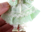 Artisan-Made Vintage 1:12 Dollhouse Porcelain Bisque Girl Figurine in Green Dress