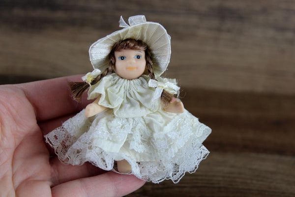 Artisan-Made Vintage 1:12 Dollhouse Porcelain Bisque Girl Figurine in White Dress with Hat Artisan-Made Vintage 1:12 Dollhouse Porcelain Bisque Girl Figurine in White Dress with Hat