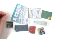 Artisan-Made Vintage 1:12 Miniature Dollhouse 9 Piece Sewing Supplies Set with Patterns, Books, Cutting Mat Boards by Carroll Meek