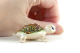 Vintage Beige Porcelain Turtle Figurine with Green & Brown Shell