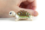 Vintage Beige Porcelain Turtle Figurine with Green & Brown Shell