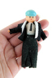 Vintage 1:12 Dollhouse Plastic Boy Son Figurine in Black Suit & Blue Hat