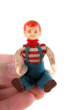Vintage 1:12 Dollhouse Plastic Seated Boy Son Figurine in Red Striped Shirt and Blue Overalls