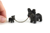 Vintage Pair of Black Celluloid Scottie Dog Figurines